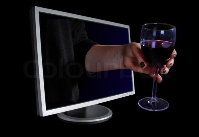 hand-with-a-glass-of-wine